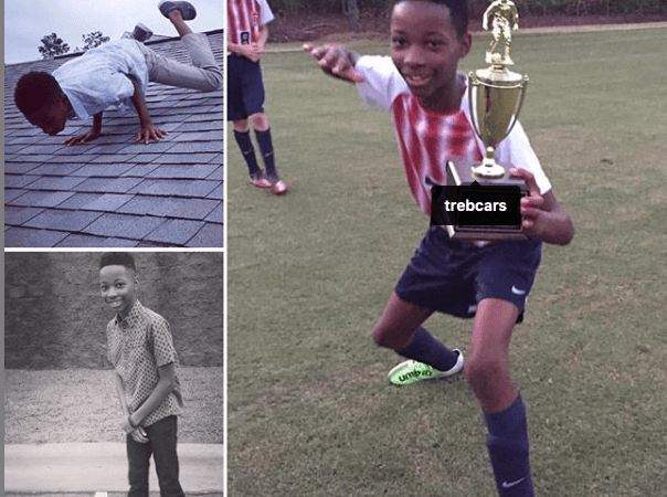 The Lessons Parents Share - Tre with a trophy and on the top of a house